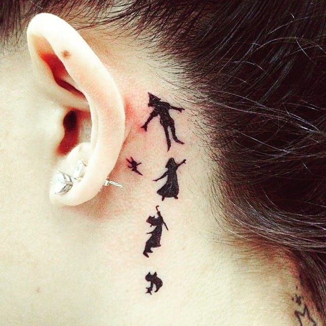 Behind the ear Peter Pan tattoo