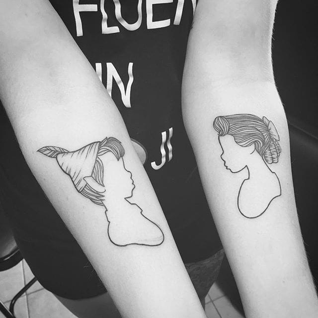 Minimalist Peter Pan and Wendy tattoo by William Buenavista