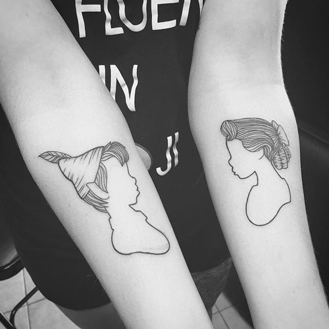 Minimalist Peter Pan and Wendy tattoo by William Buenavista