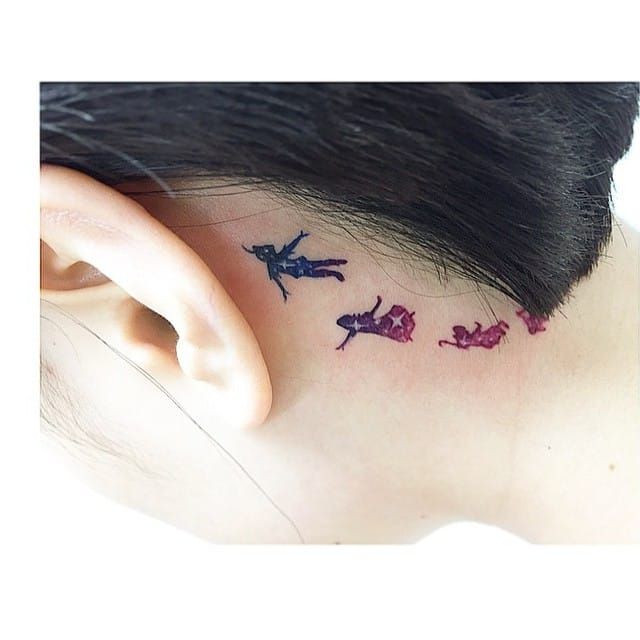 Peter Pan behind the ear tattoo by by @tattooist_banul