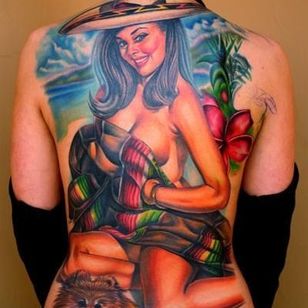 That's one big pin-up tattoo ! Also by master Nikko Hurtado.