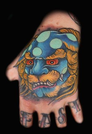 Bright Hand Tattoo by Matt Hart