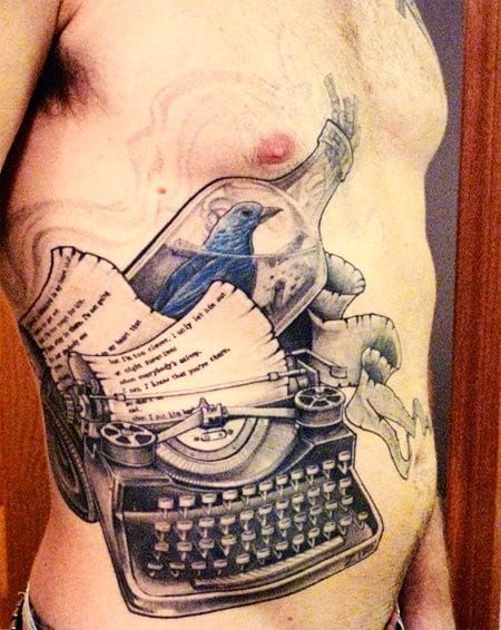 Bukowski's universally relatable message of the bluebird is depicted well in this detailed ribcage tattoo.