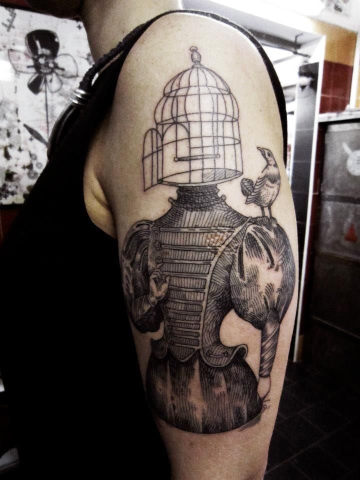 19 Meaningful Bird Cage Tattoo Designs