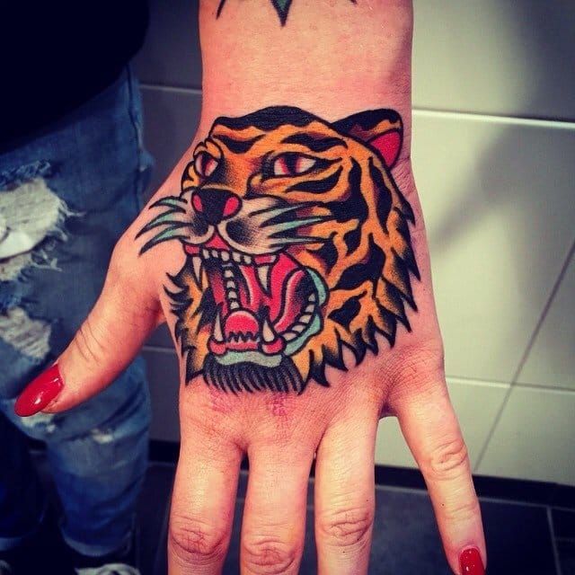 8 Awesome Tiger Head Tattoos On Hands • Tattoodo