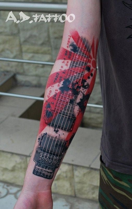 Graphic guitar tattoo by A.D. Pancho too.
