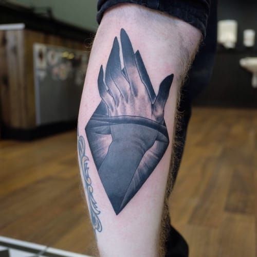 Vivid Hand Tattoo by Oliver White