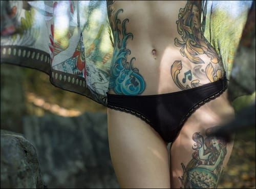 Tattooed stomach hi-res stock photography and images - Alamy