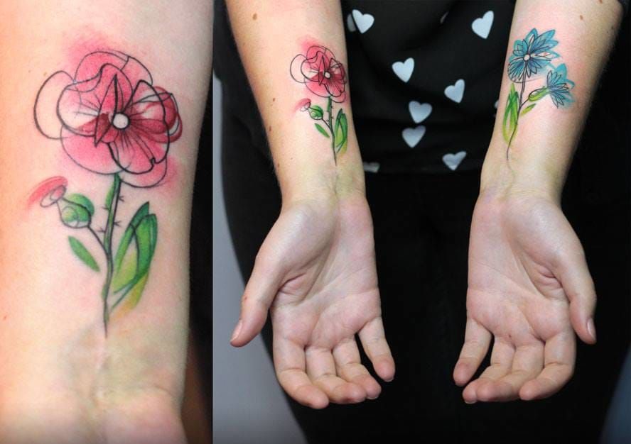 Matching flower tattoos.