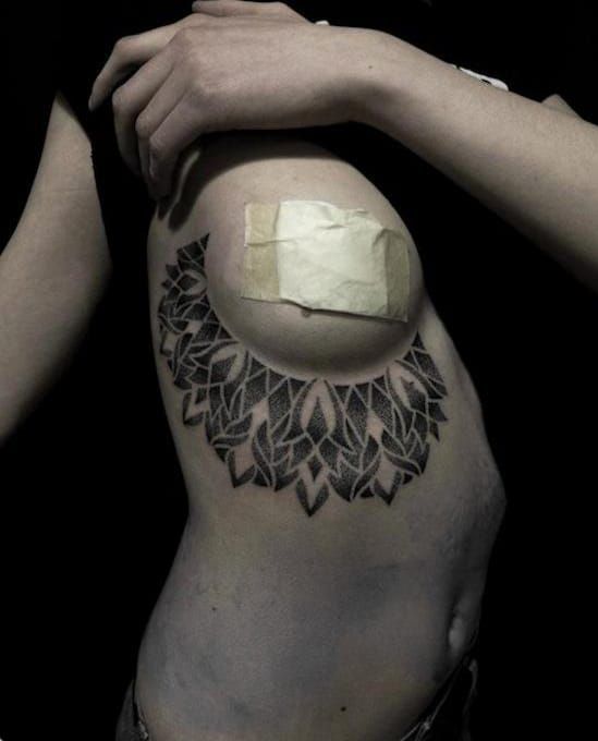 Beautiful dotwork side boob by Alex Arnautov