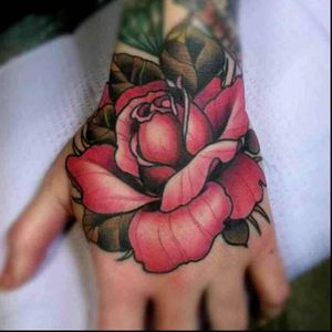 Neo-traditional Rose hand tattoo
