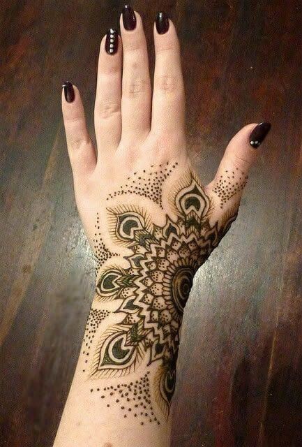 Beautiful mehndi hand tattoo.