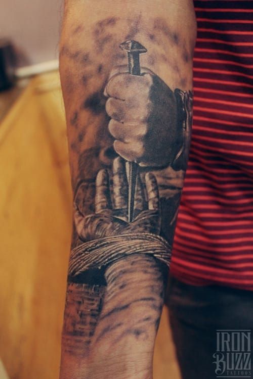Graphic crucifixion tattoo by Eric Jason Dsouza...