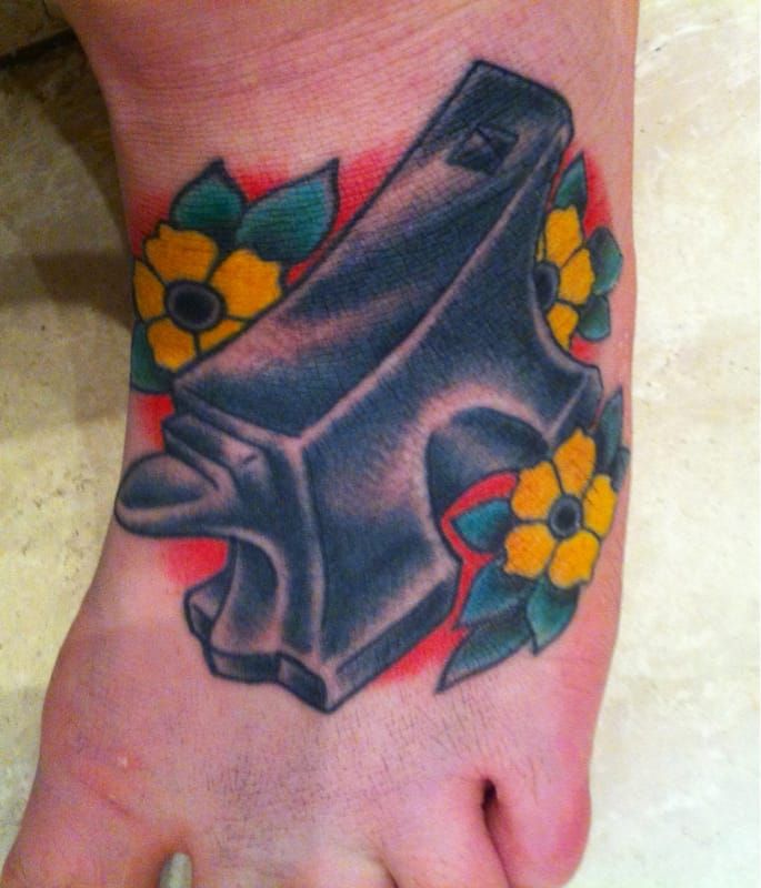 hammer and anvil tattoo traditional