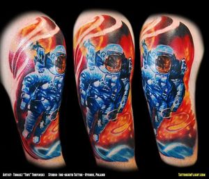 Cosmonaut tattoo by Tomasz Tofi Torfinski.