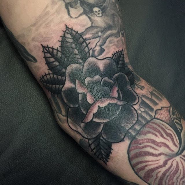 Blast Over Rose Tattoo by Jimmy Bruce