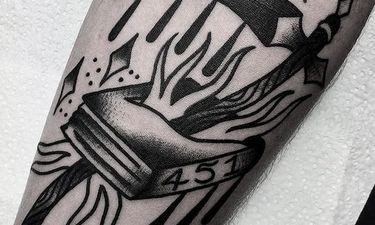 traditional scythe tattoo