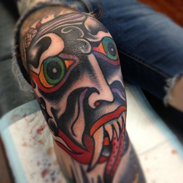 Monster head knee tattoo, by the awesome Chad Koeplinger