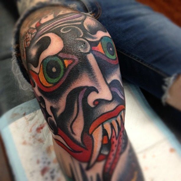 Monster head knee tattoo, by the awesome Chad Koeplinger
