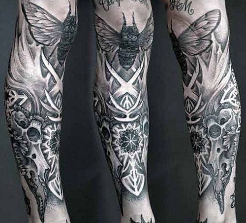 Awesome black and grey tattoo by Thomas Hooper