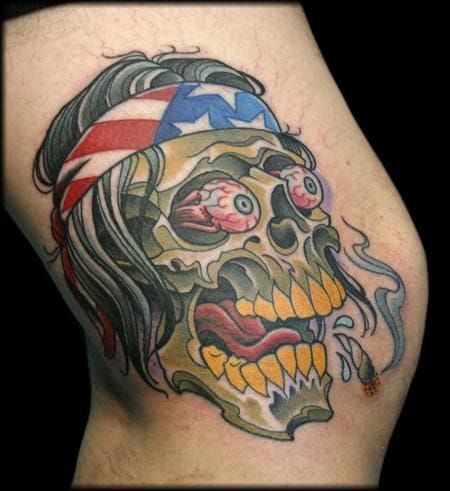 Side knees skull tattoo