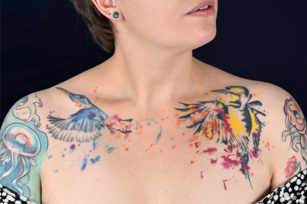 Entirely hand poked collar bone tattoos.