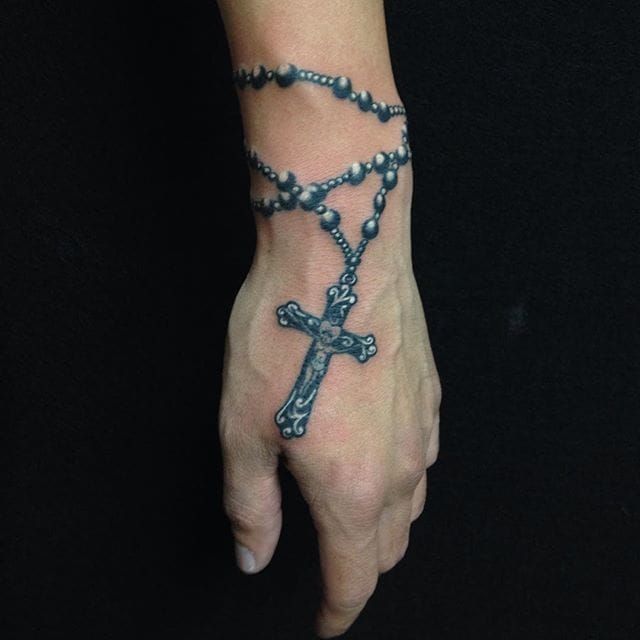 christian cross rosary tattoo | Wrist tattoos for guys, Cross tattoos for  women, Cross tattoo
