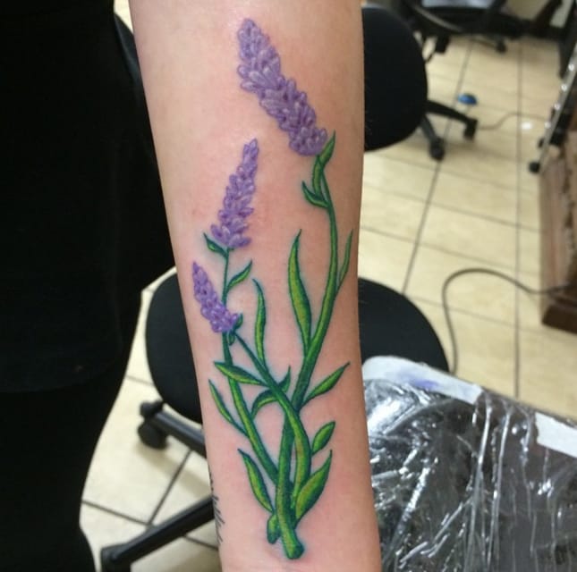 Bright colours in this lavender tattoo by @jaketheripper616 (photo credit Instagram).