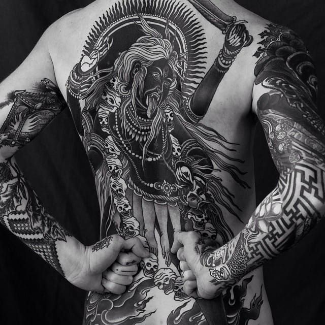 Blackwork backpiece by Alexander Grim.