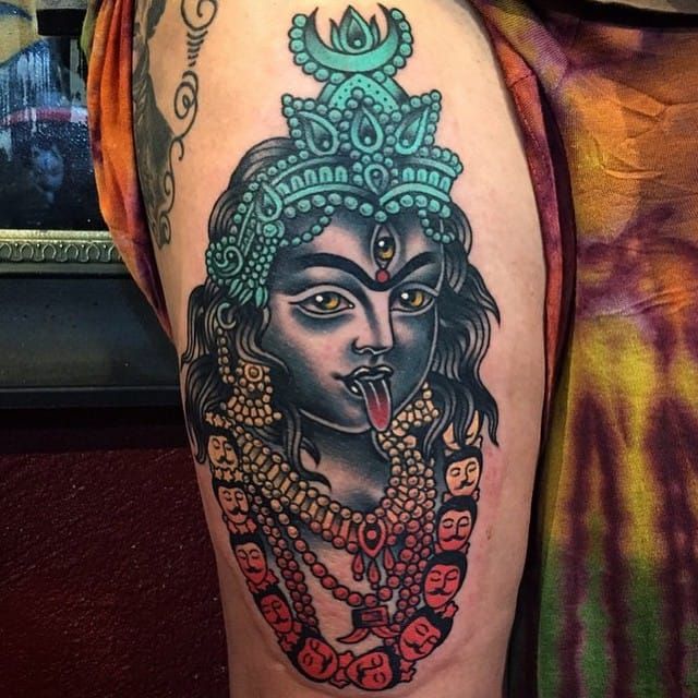 Colorful tattoo by Phil Hatchet-Yau.