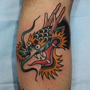 Solid Dragon Head Tattoo by Josh Sutterby