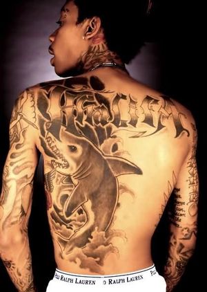 Rapper Wiz Khalifa and his backpiece made at Dark Star Tattoo in Vancouver #shark #blackandgrey #darkstartattoo #wizkhalifa #rapper