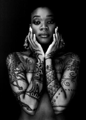 Breath-taking photography of model Moniasse Sessou, tattooed by Touka Voodoo of London. #toukavoodoo #moniassesessou #darkskintattoo #tattoosondarkskin #darkskintattoos