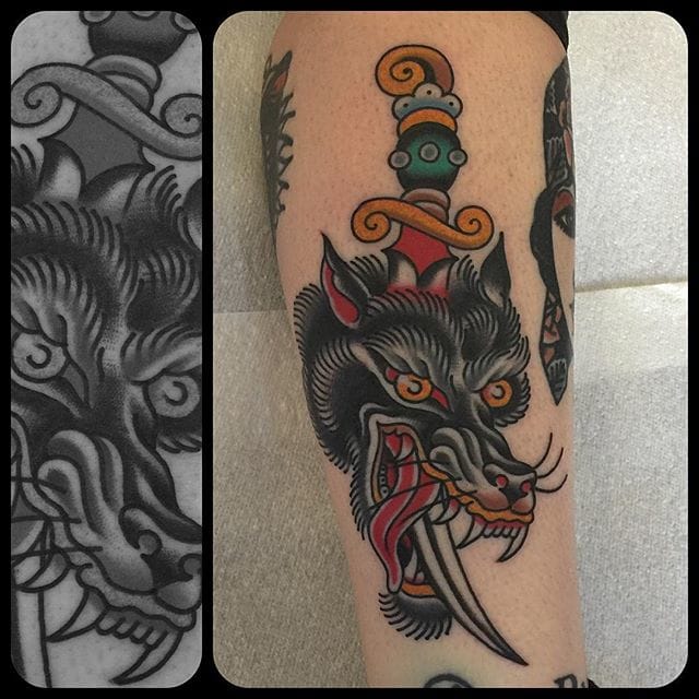 traditional wolf dagger tattoo