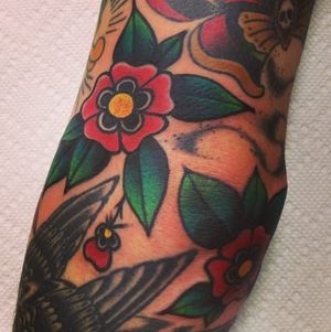 Traditional Flower Filler Tattoo by Greg Christian