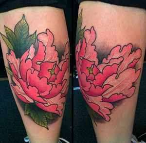 Stunning peony knee tattoo by Brock, Red Door Tattoo (Instagram @reddoortattoo).