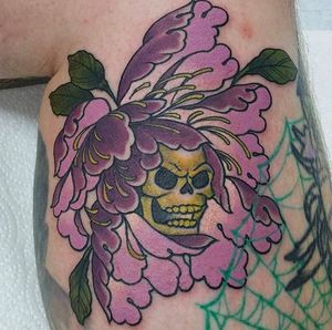 Skull in a peony tattoo by Ty Kohle (Instagam @tykohle).