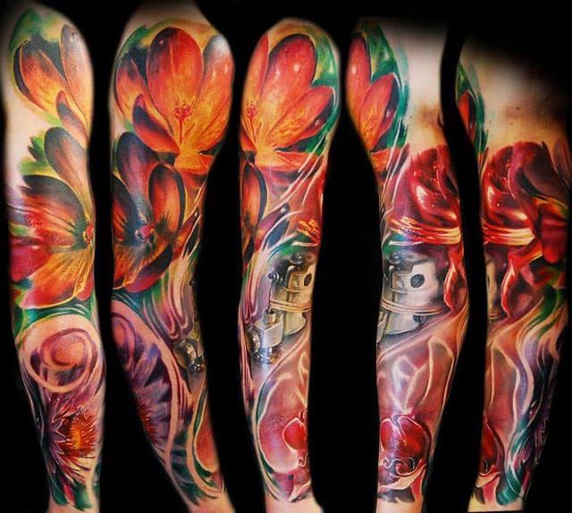 Vibrant flowers; full sleeve by Tomasz Tofi Torfinski