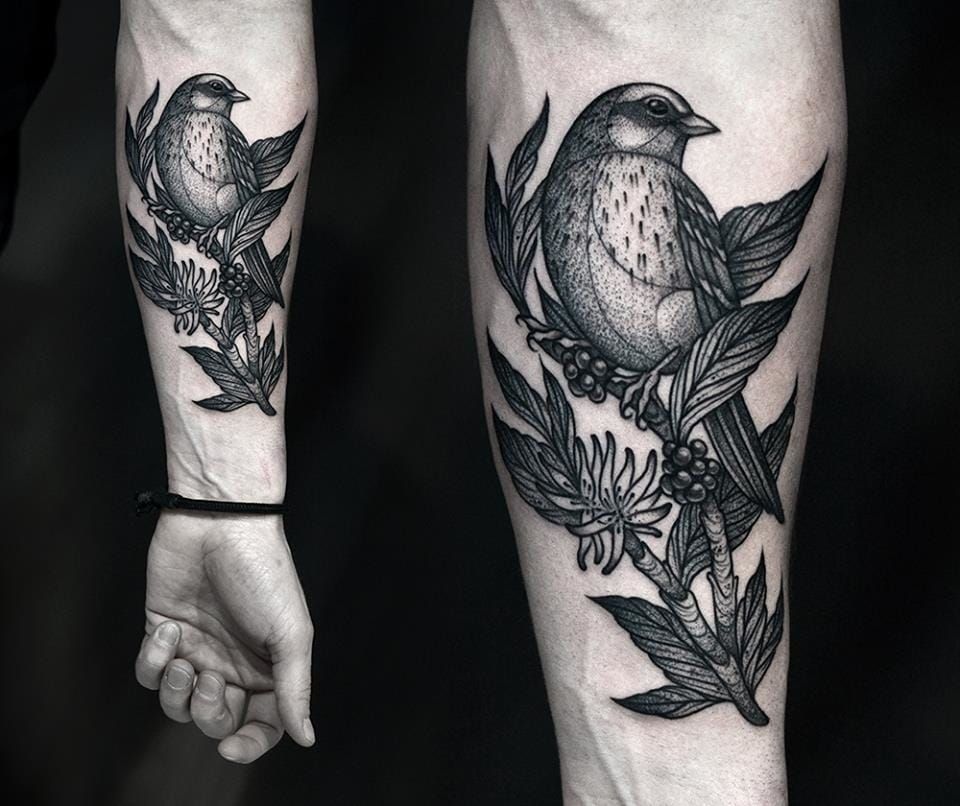 Single needle birds on a branch tattoo located on the