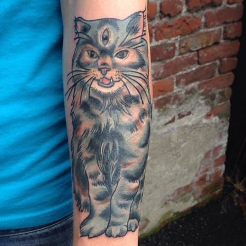 Threeeyed cat tattoo inked on the right arm  Eye tattoo Cat tattoo Arm  tattoo