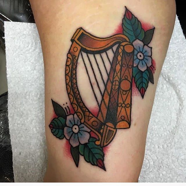 Irish Harp and Shamrocks Tattoo  Tattoo Ideas and Inspiration  Irish  tattoos Leprechaun tattoos Irish harp tattoo