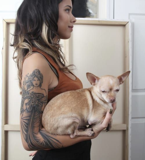 A nice arm holding that doggy, by Javier Betancourt.