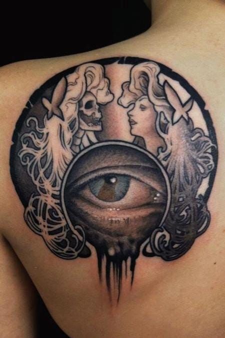 Creepy Mucha inspired tattoo by Clod The Ripper.