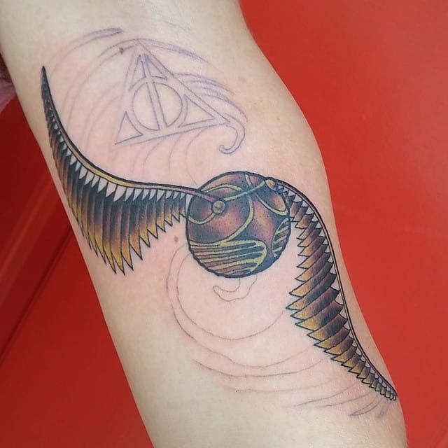 Golden snitch tattoo by Simona Merlo  Post 29889