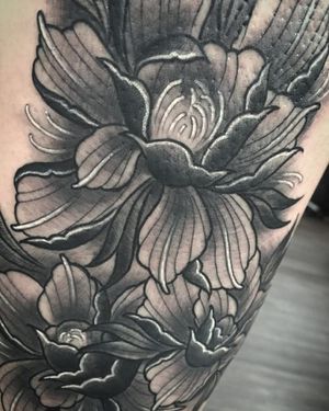 Just one isn't enough!!!! Peonies tattoo, artist unknown