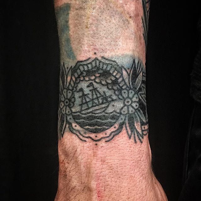 Blast Over Cuff Tattoo by Bastien Jean