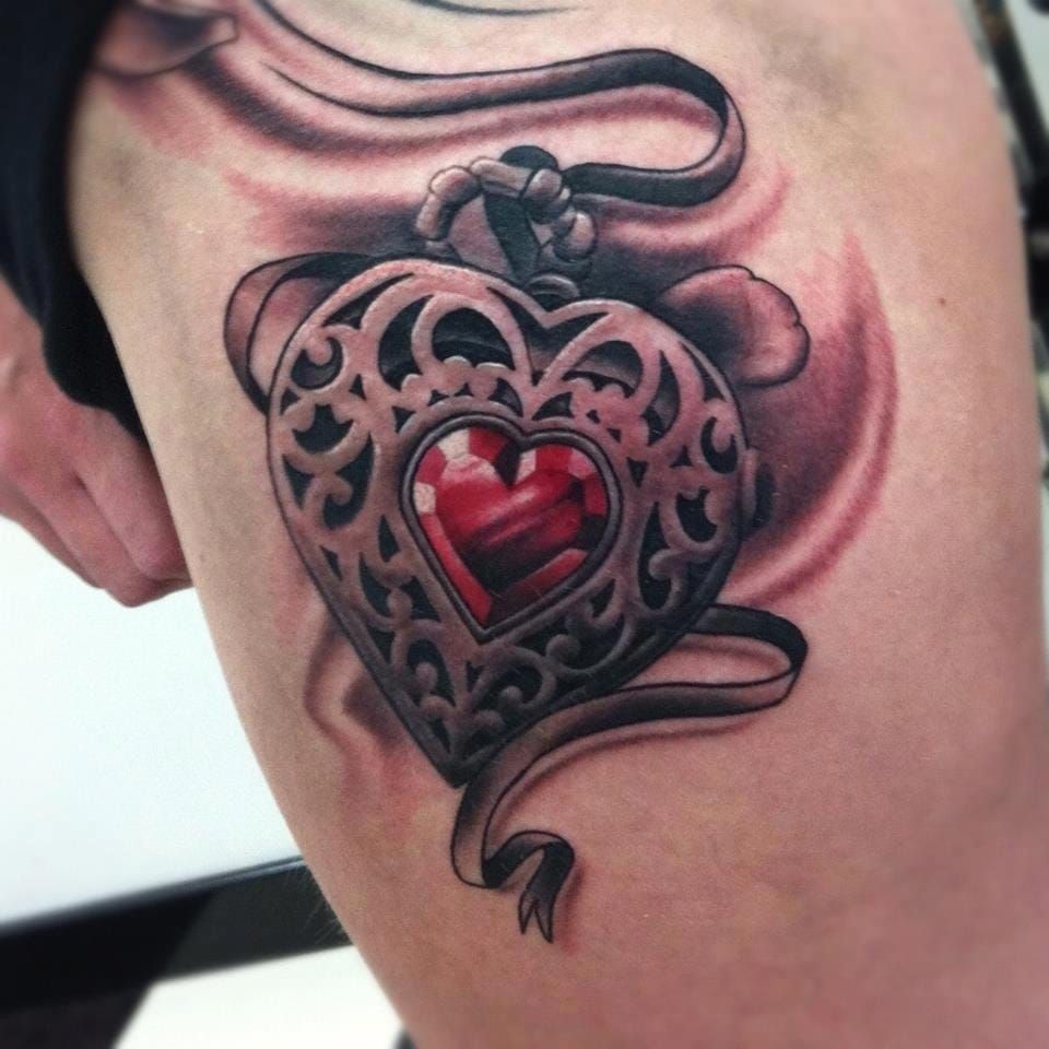 Ruby-jeweled black and gray heart locket by Pete The Thief