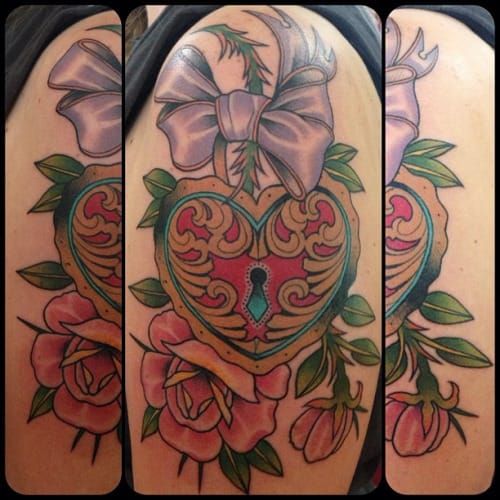 Neotraditionl roses and ribbon heart locket tattoo by Guen Douglas
