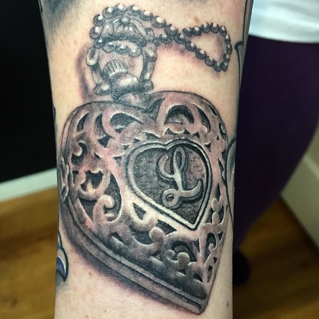 Realistic black and gray heart locket by Tattoo Tony