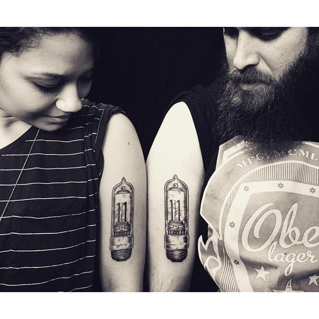 Matching couple light bulb tattoos by Elanmie Steinway #coupletattoo #lightbulb #matching #blackwork